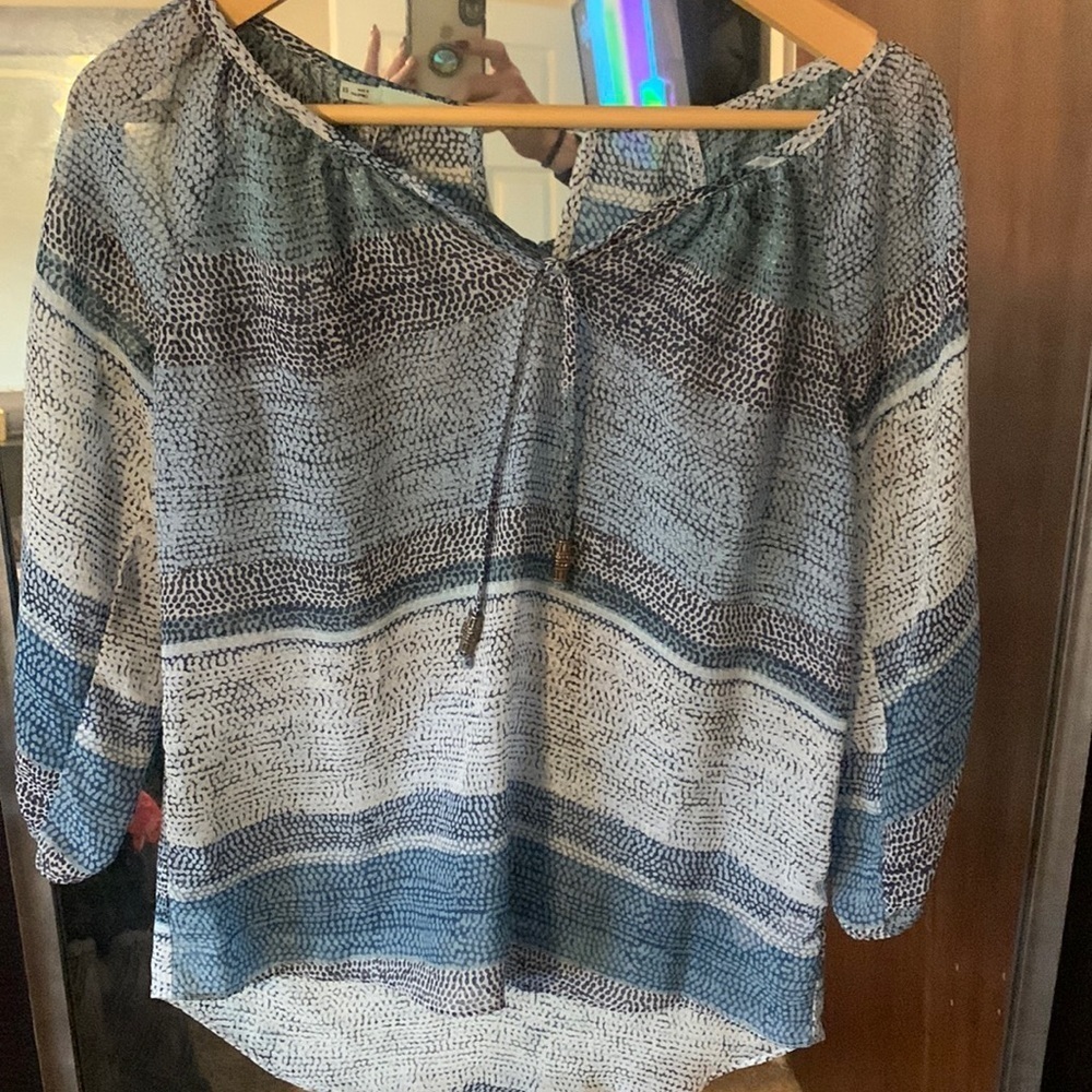 Maurices woman’s top size XS. Extra Small. Blue hues. Sheer.